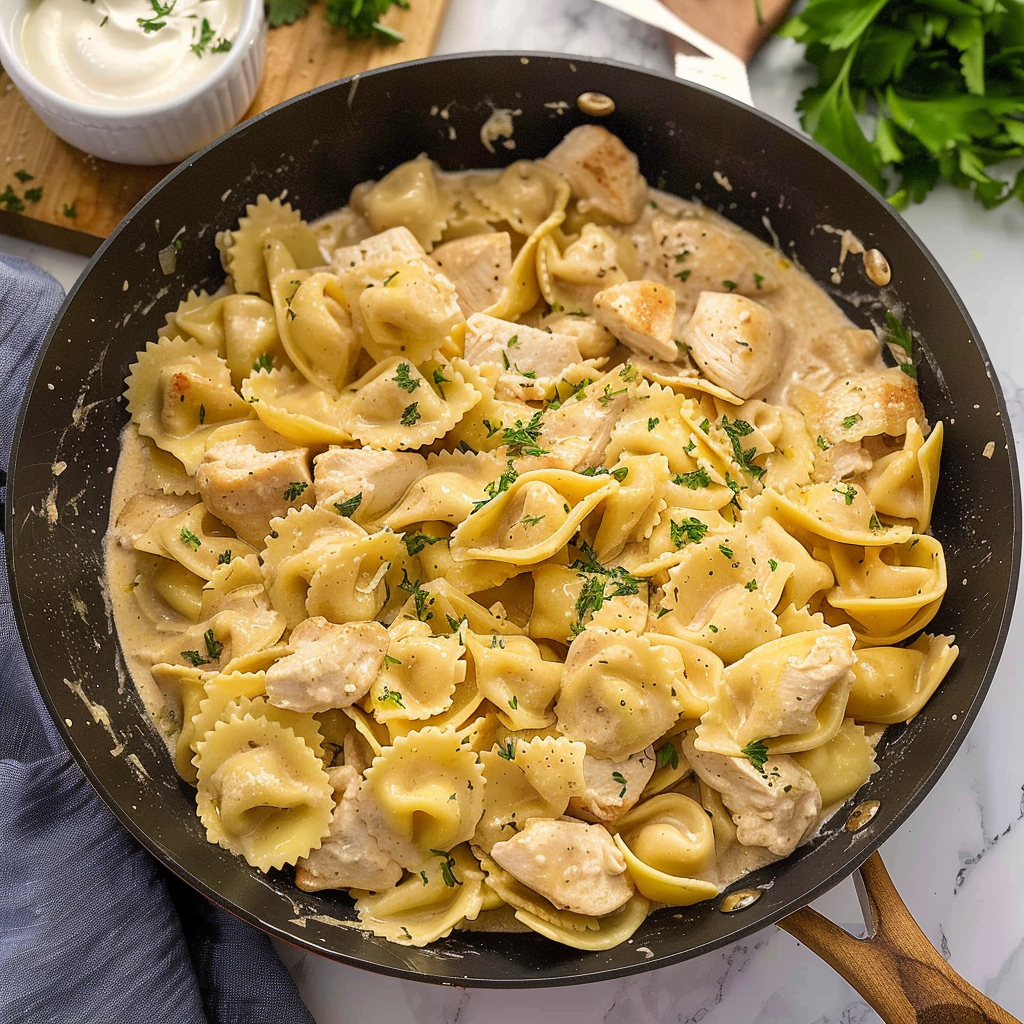 Recipe preparation for Skillet Chicken Tortellini Alfredo